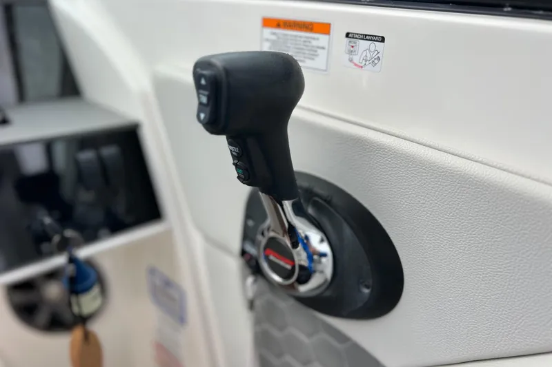 Slide: The Image of Throttle control of 2020 Sea Ray SDX 270 Outboard boat, close-up view. - 18