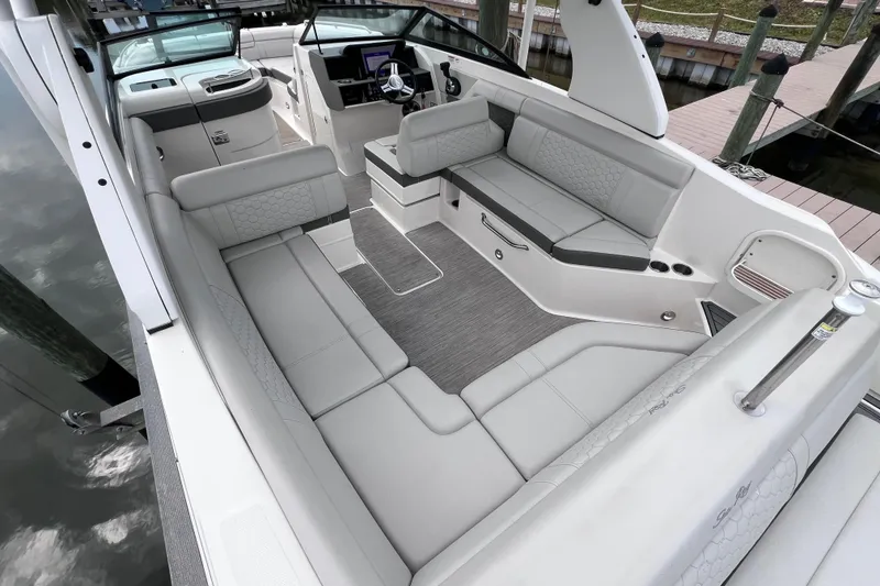Slide: The Image of 2020 Sea Ray SDX 270 Outboard boat interior with spacious seating and modern design. - 22