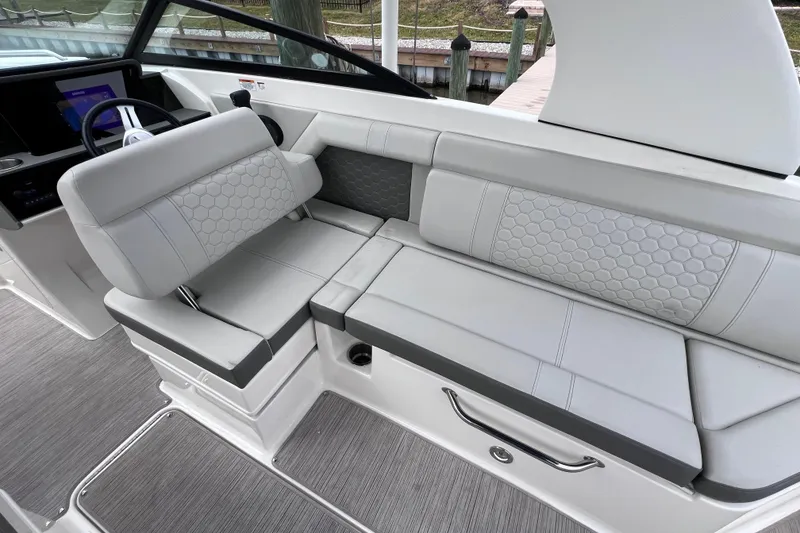 Slide: The Image of 2020 Sea Ray SDX 270 Outboard interior with luxurious seating and modern design. - 28