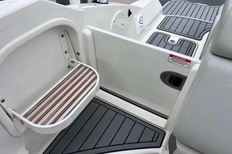 Slide: The Image of 2020 Sea Ray SDX 270 Outboard boat interior with step and non-slip flooring. - 39