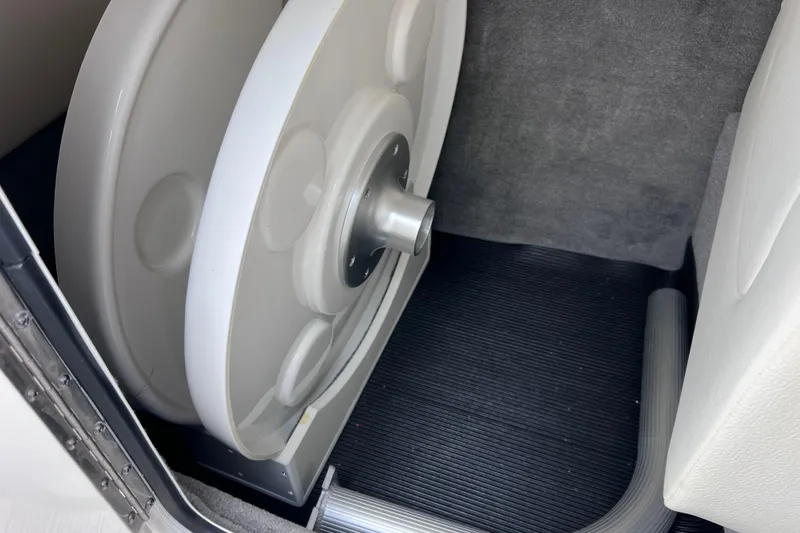 Slide: The Image of 2020 Sea Ray SDX 270 Outboard interior detail with storage compartment. - 44