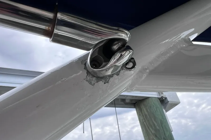 Slide: The Image of Close-up of a 2020 Sea Ray SDX 270 Outboard boat's metal fitting detail. - 51