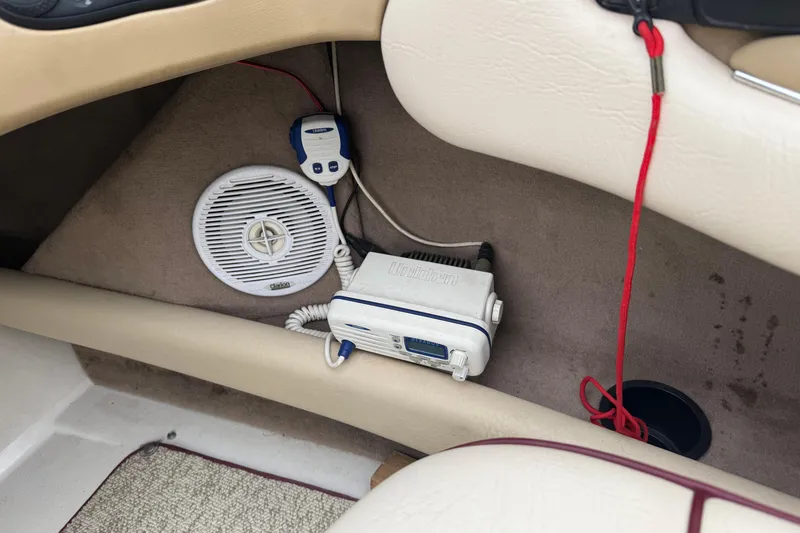 Slide: The Image of Interior of 2000 Sea Ray 210 Bow Rider with radio and speaker system. - 16