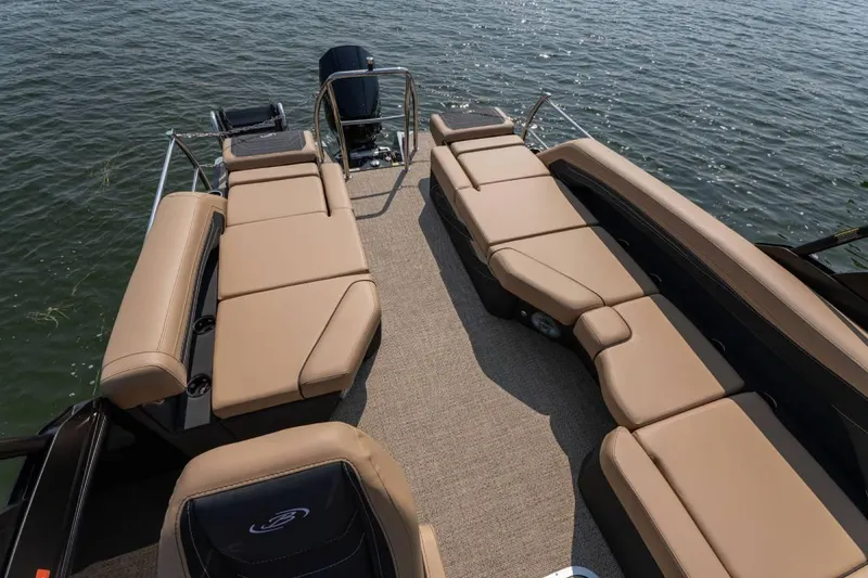 Slide: The Image of Manufacturer Provided Image: 2026 Barletta Cabrio 22M boat interior with tan seating and water view. - 7