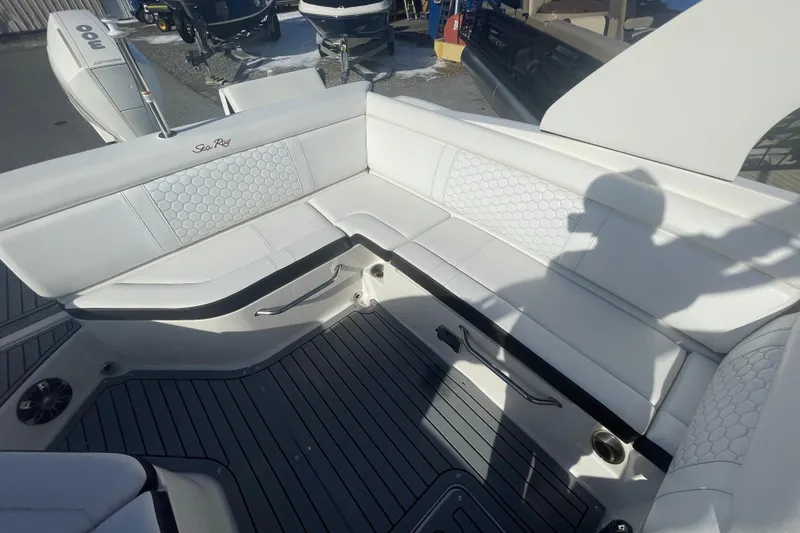 Slide: The Image of 2020 Sea Ray SDX 270 Outboard boat with white seating and sleek design. - 13
