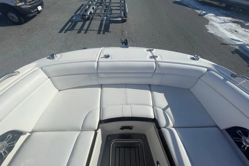 Slide: The Image of 2020 Sea Ray SDX 270 Outboard boat with spacious white seating area. - 22