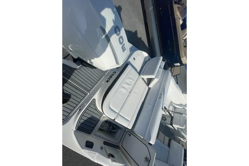 Slide: The Image of 2020 Sea Ray SDX 270 Outboard boat with white seating and deck view. - 8