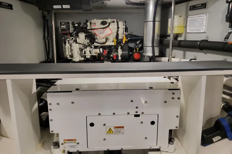 Slide: The Image of Engine room of 2026 Formula 400 Super Sport Crossover, showcasing mechanical components and equipment. - 12