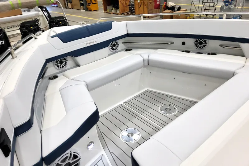 Slide: The Image of 2026 Formula 400 Super Sport Crossover boat interior with sleek seating and modern design. - 14