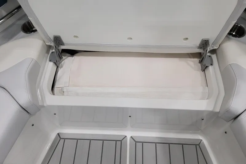 Slide: The Image of Open storage compartment in 2026 Formula 400 Super Sport Crossover boat. - 17