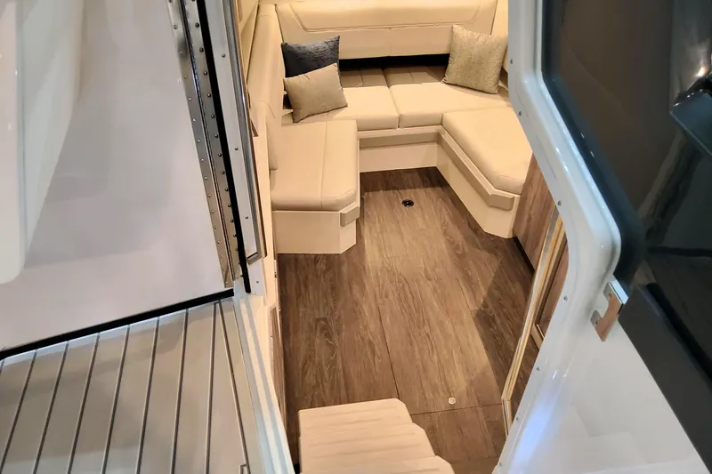 Slide: The Image of Interior of 2026 Formula 400 Super Sport Crossover with elegant seating and wood flooring. - 21