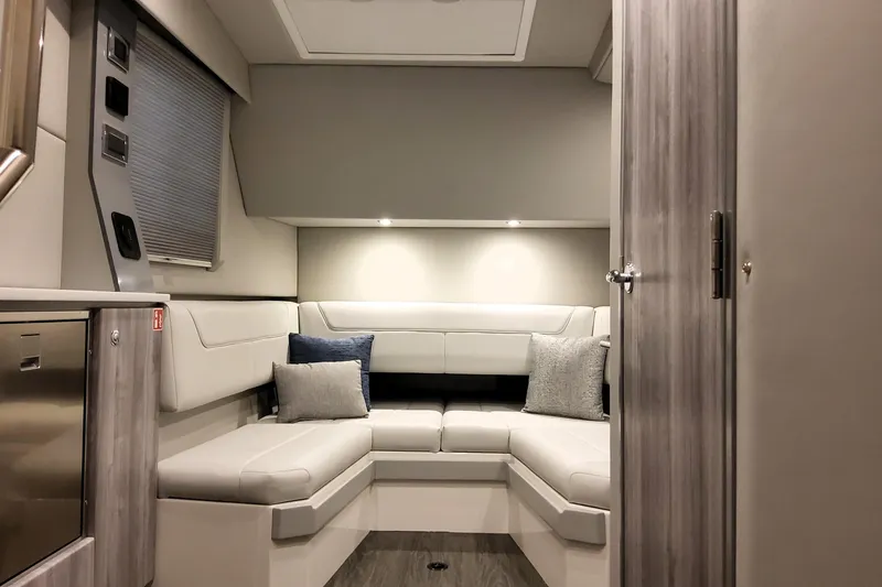 Slide: The Image of Luxurious interior of 2026 Formula 400 Super Sport Crossover with modern seating and cushions. - 22