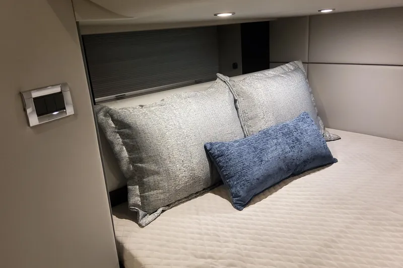 Slide: The Image of Luxurious interior of 2026 Formula 400 Super Sport Crossover with plush pillows and modern lighting. - 29