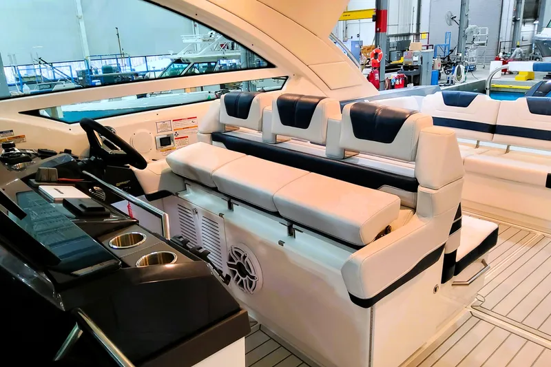 Slide: The Image of 2026 Formula 400 Super Sport Crossover luxury boat interior with plush seating and modern dashboard. - 34
