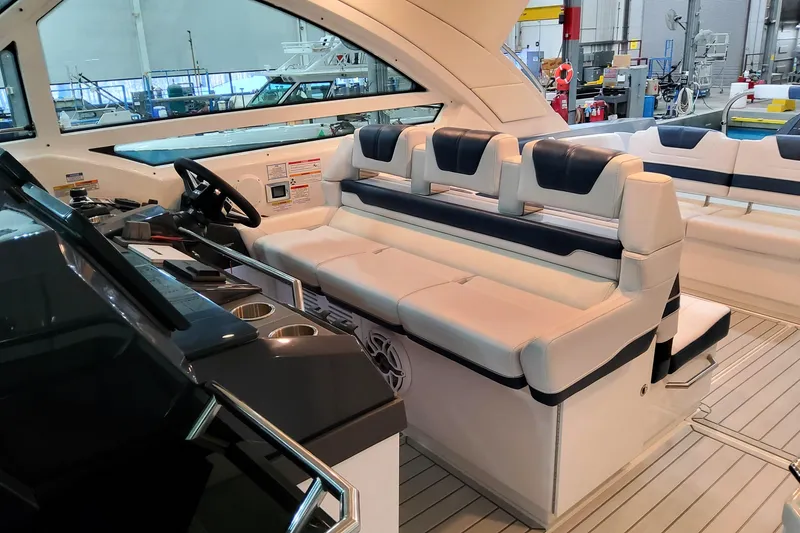 Slide: The Image of 2026 Formula 400 Super Sport Crossover interior with luxurious seating and modern helm design. - 7
