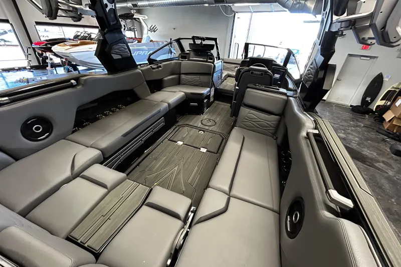 Slide: The Image of 2025 Supra SE boat interior with luxurious seating and modern design. - 5