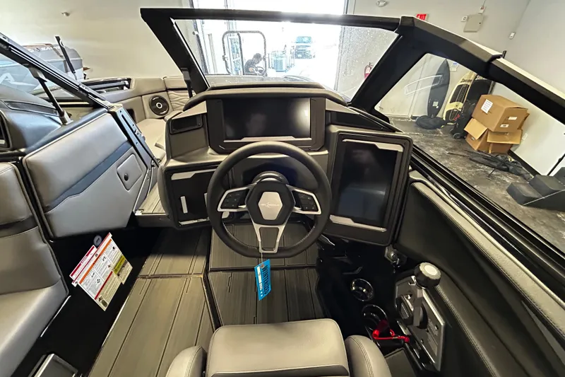 Slide: The Image of 2025 Supra SE boat interior with modern dashboard and steering wheel design. - 9