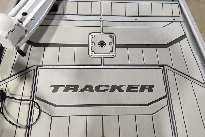 Slide: The Image of 2026 Tracker Bass Tracker Classic CC boat deck with logo and mounting point. - 14