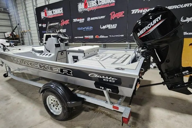 Slide: The Image of 2026 Tracker Bass Tracker Classic CC boat with Mercury engine on trailer. - 3