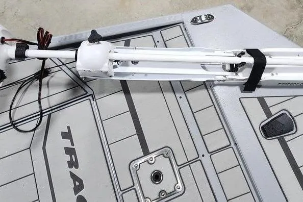 Slide: The Image of 2026 Tracker Bass Tracker Classic CC boat deck with mounted trolling motor. - 9