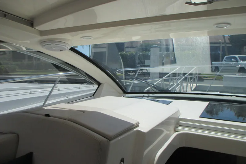 Slide: The Image of Interior view of 2013 Pursuit SC 365i Sport Coupe, showcasing sleek design and spacious seating. - 20