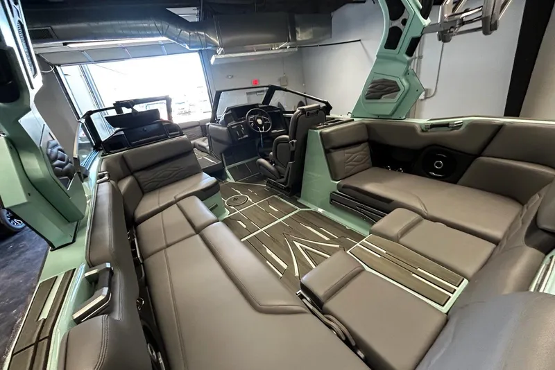 Slide: The Image of Luxurious interior of 2025 Supra SA boat with sleek seating and modern design. - 6