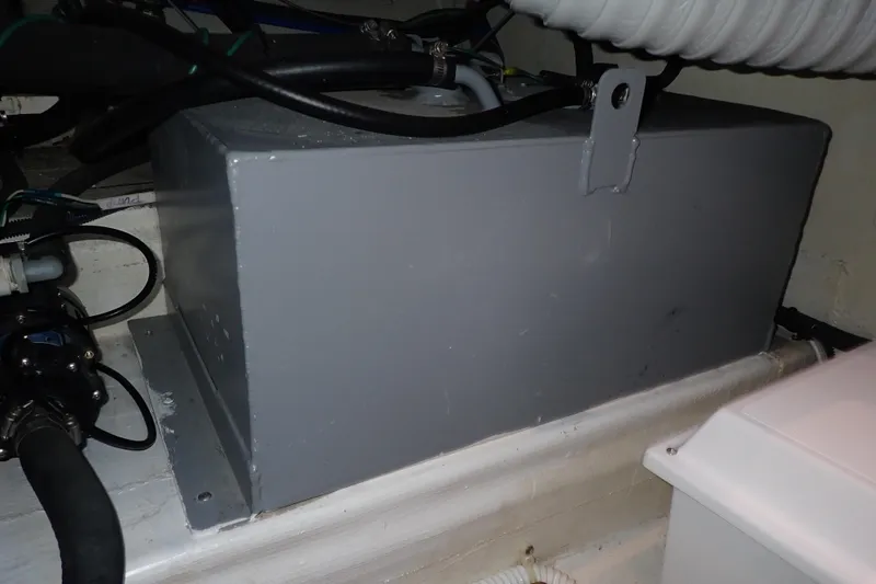 Slide: The Image of Engine compartment of 2023 True North 34 Outboard Express boat, featuring mechanical components. - 109