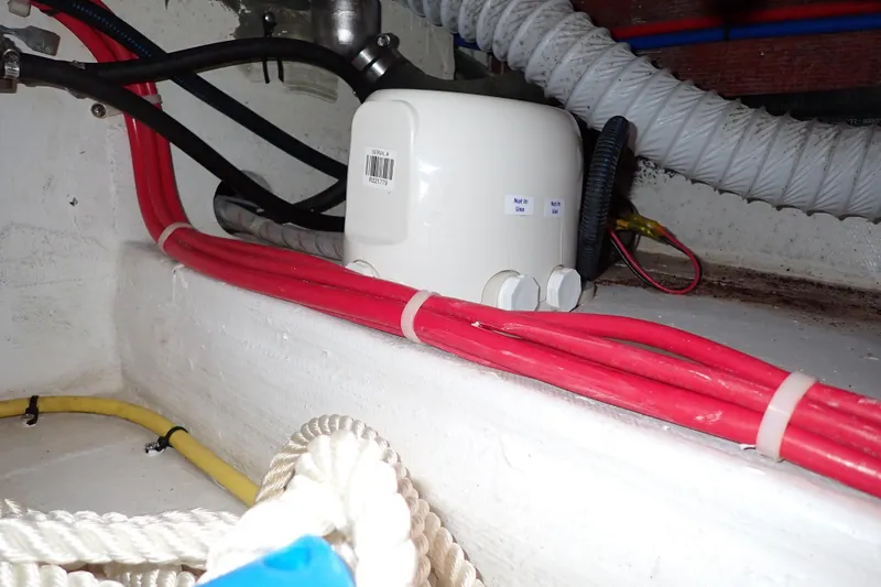 Slide: The Image of Electrical wiring and components inside 2023 True North 34 Outboard Express boat. - 136