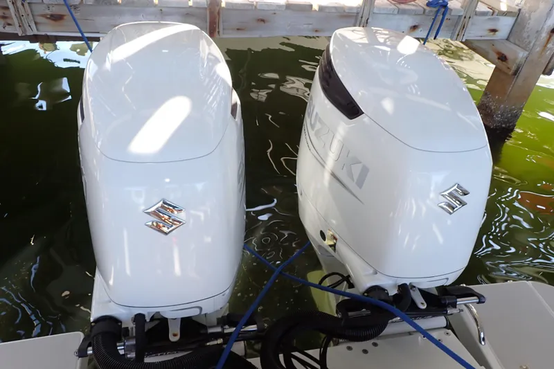 Slide: The Image of Twin Suzuki outboard engines on 2023 True North 34 Outboard Express boat. - 137