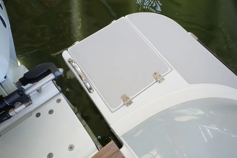 Slide: The Image of 2023 True North 34 Outboard Express boat deck detail with hatch and hardware. - 140