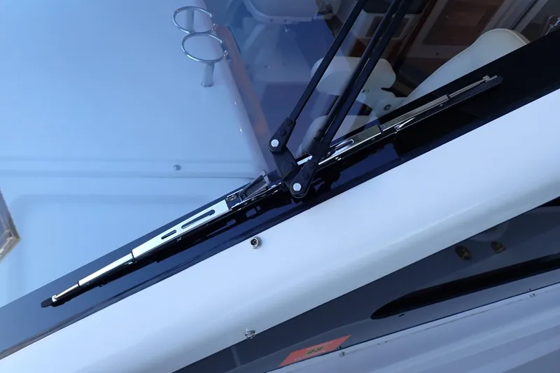 Slide: The Image of Windshield wiper on 2023 True North 34 Outboard Express boat, close-up view. - 145