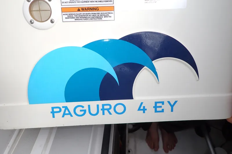Slide: The Image of Paguro 4 EY logo on 2023 True North 34 Outboard Express boat. - 149