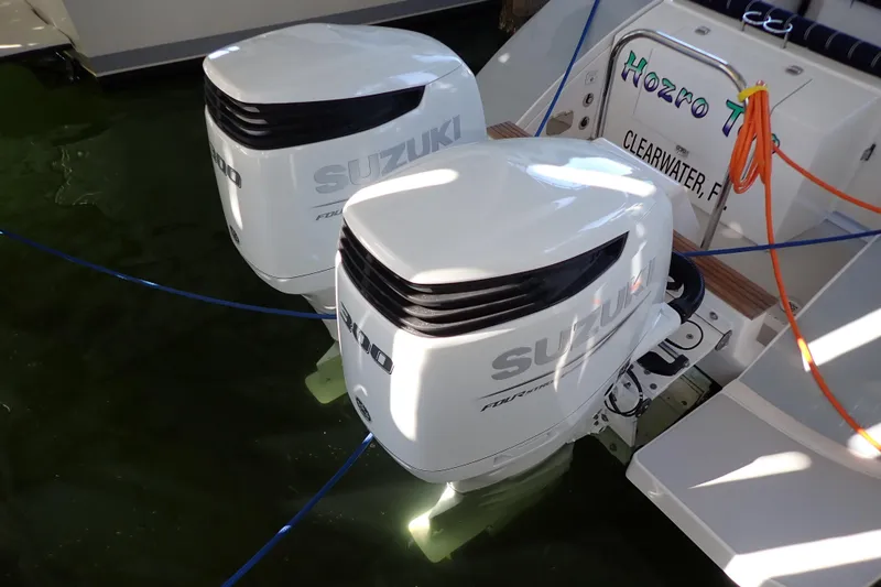Slide: The Image of Twin Suzuki outboard engines on 2023 True North 34 Outboard Express boat. - 42