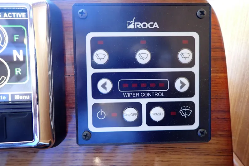 Slide: The Image of Control panel for wipers on 2023 True North 34 Outboard Express boat. - 58