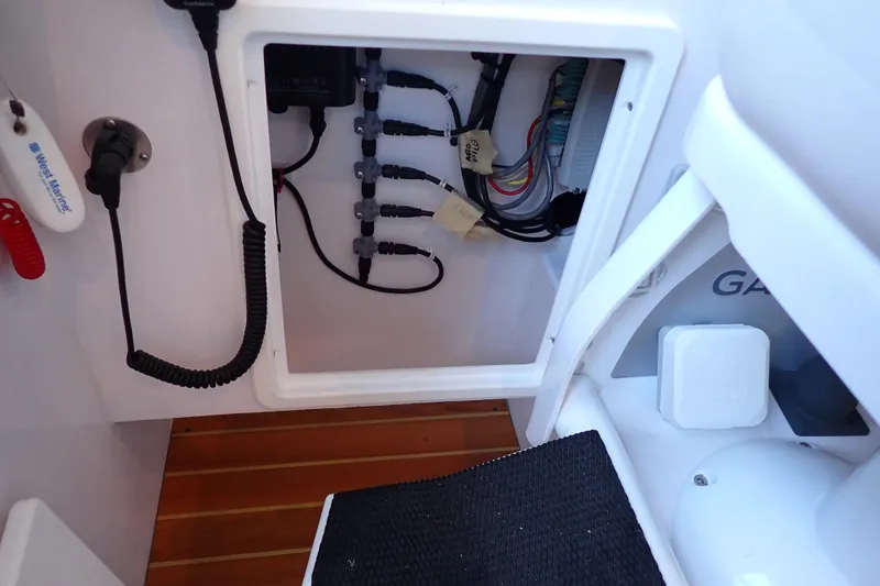 Slide: The Image of 2023 True North 34 Outboard Express electrical panel with wiring and connections. - 86