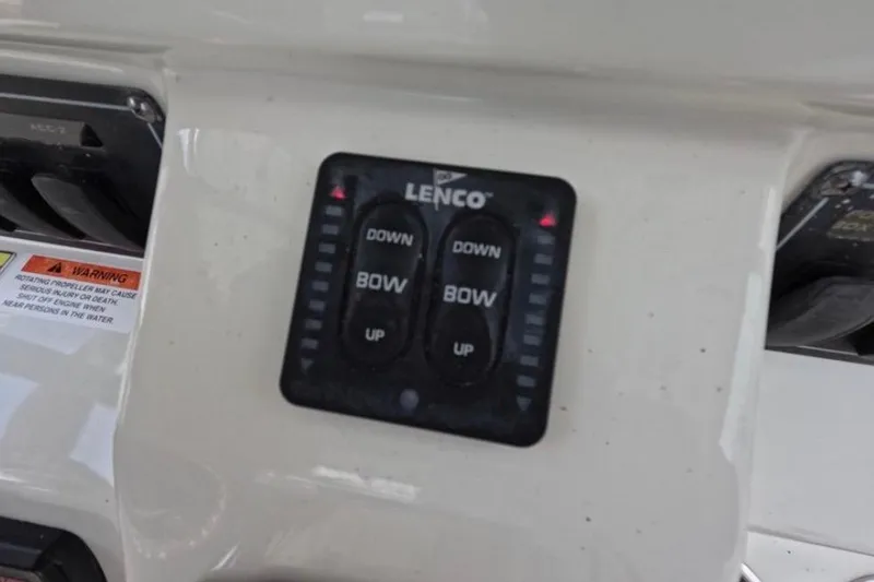 Slide: The Image of Manufacturer Provided Image: 2013 Boston Whaler 320 Outrage boat interior bathroom with toilet and storage compartments. - 12