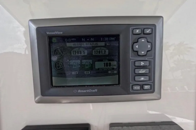 Slide: The Image of Manufacturer Provided Image: 2013 Boston Whaler 320 Outrage boat deck with twin Mercury engines. - 14