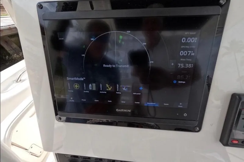 Slide: The Image of Control panel of a 2013 Boston Whaler 320 Outrage boat. - 15