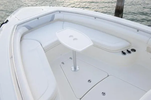 Slide: The Image of Manufacturer Provided Image: 2013 Boston Whaler 320 Outrage boat cruising on open water. - 5
