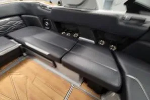 Slide: The Image of 2025 Supra SA interior with sleek black seating and modern design elements. - 11