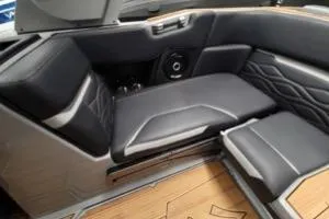 Slide: The Image of 2025 Supra SA interior with sleek black seating and modern design elements. - 12