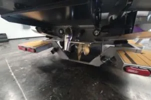 Slide: The Image of 2025 Supra SA boat underside with propeller and swim platform details. - 8