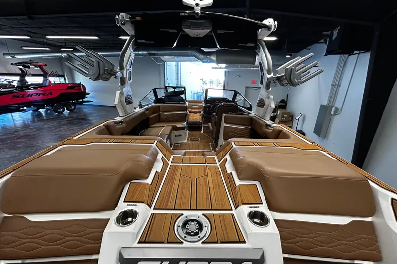Slide: The Image of 2025 Supra SA boat interior with luxurious brown seating and modern design features. - 4
