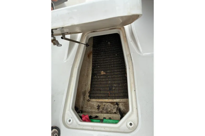 Slide: The Image of Open storage compartment in 2013 Monterey 214SS Super Sport boat. - 22