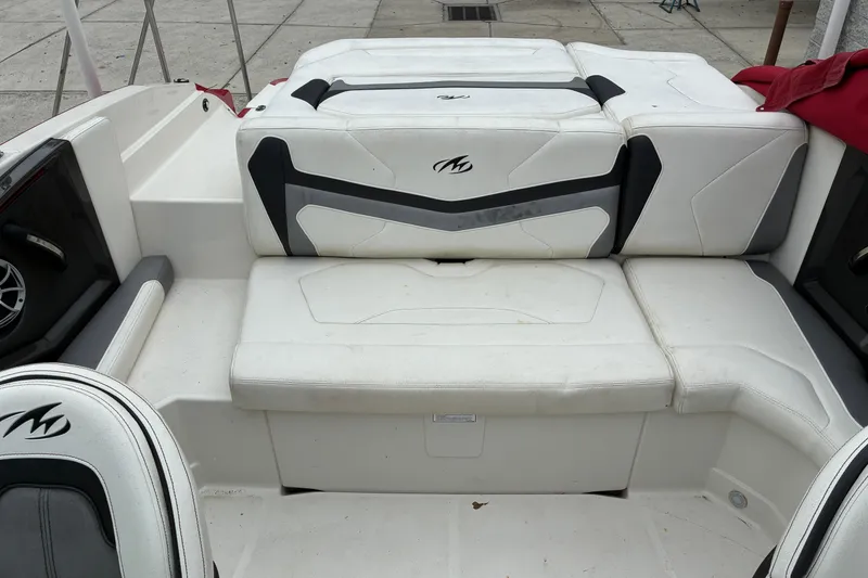 Slide: The Image of 2013 Monterey 214SS Super Sport boat interior with white and gray seating. - 3