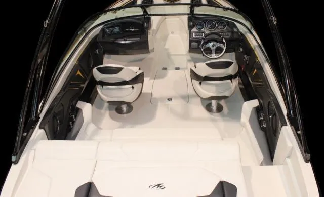 Slide: The Image of Manufacturer Provided Image: 2013 Monterey 214SS Super Sport boat interior with dual seats and dashboard. - 4