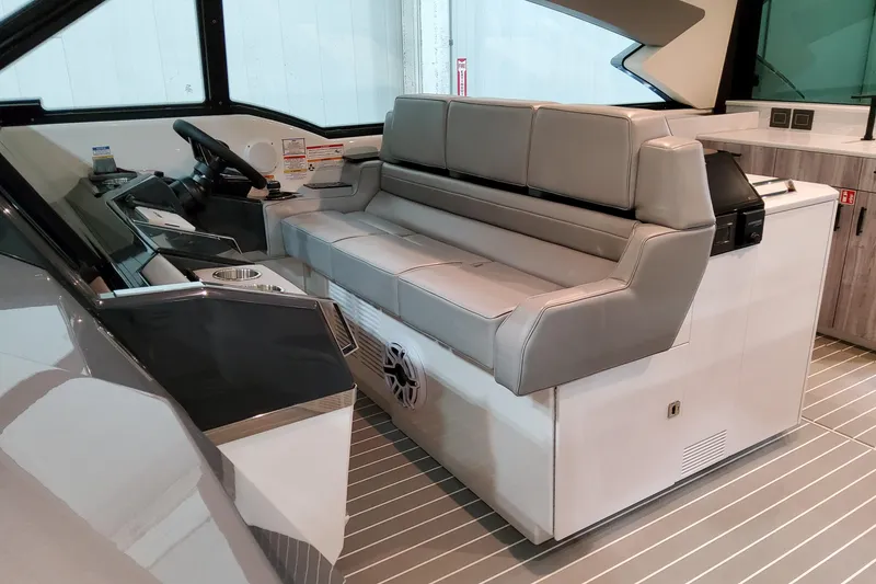 Slide: The Image of 2026 Formula 500 Super Sport Crossover interior with sleek seating and modern dashboard. - 10