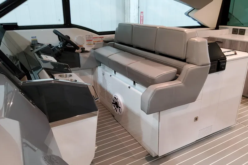 Slide: The Image of 2026 Formula 500 Super Sport Crossover interior with sleek seating and modern dashboard design. - 9