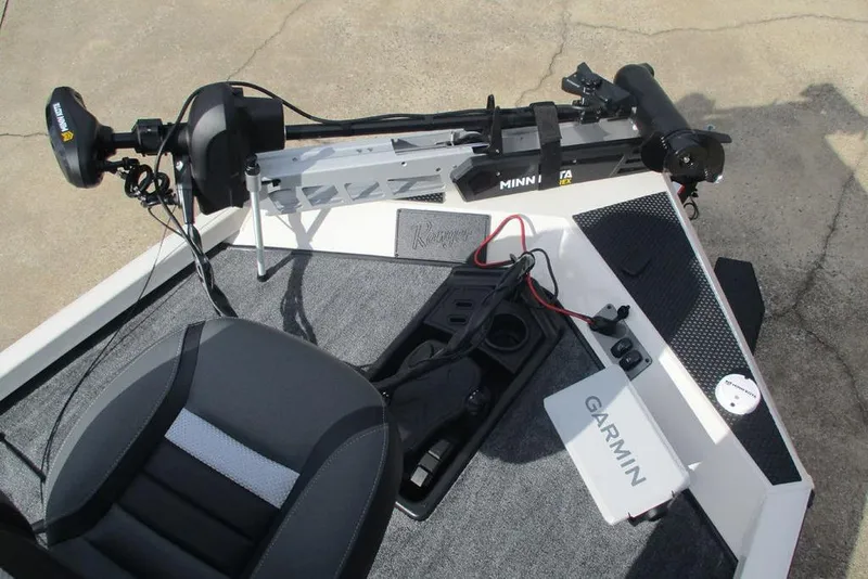 Slide: The Image of 2026 Ranger RT188 boat deck with Minn Kota trolling motor and Garmin device. - 10