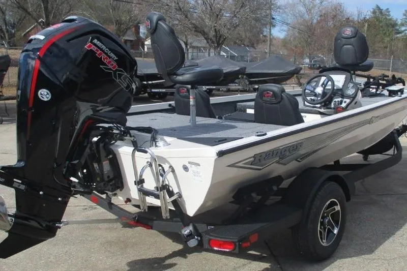 Slide: The Image of 2026 Ranger RT188 boat with Mercury engine, parked on trailer, ready for fishing adventures. - 4